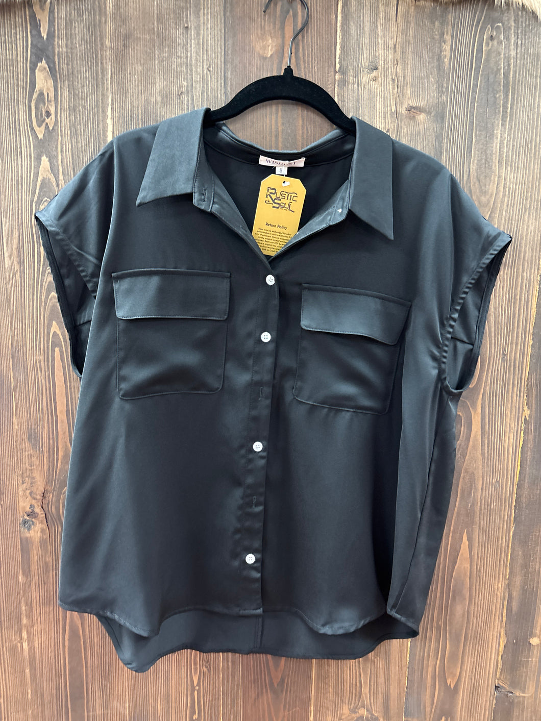 Sleeveless Button Up Shirt.