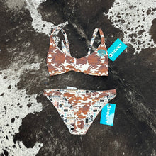 Load image into Gallery viewer, hooey lady’s swim suit set cream cow print reversible hooey logo