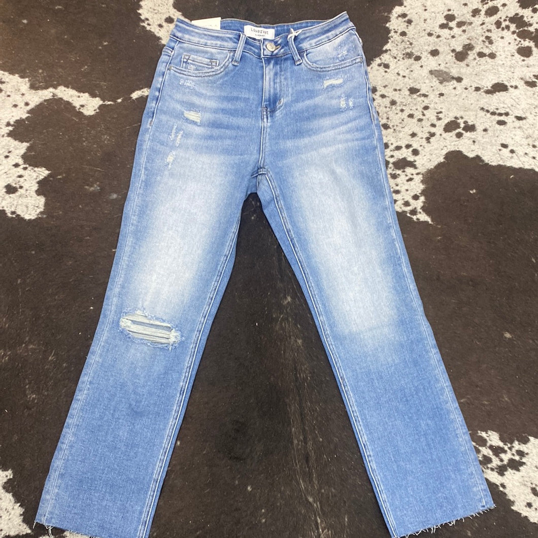 High Rise Slim Straight Jeans.